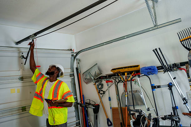 Professional Garage Door Panel Replacement technician working in Wendell, ID